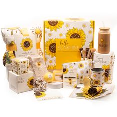 the sunflowers are on display in front of the box and other items to make it