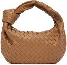 Intrecciato-woven buffed lambskin shoulder bag in brown. · Carry handle with knotted detailing · Zip closure · Calfskin lining · H8 x W14 x D5 in Supplier color: Caramel gold | Bottega Veneta Brown Teen Jodie Shoulder Bag Designer Brown Bags With Interwoven Design, Brown Top Handle Shoulder Bag With Interwoven Design, Designer Brown Bag With Interwoven Design, Luxury Brown Shoulder Bag With Interwoven Design, Botega Bag Jodie, Luxury Brown Bags With Intrecciato Weave, Bottega Bags, Bottega Intrecciato Hobo, Bottega Jodie