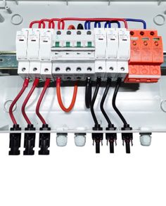 an electrical panel with multiple surge breakers and wires