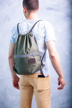 "Leather drawstring backpack,Leather backpack men,Drawstring bag men,Leather gymsack,Leather drawstring bag,Green leather backpack SIZE: 38x26x10 cm (15x10.2x4\")" Everyday Backpack Gym Bag With Drawstring, Everyday Drawstring Backpack Bag, Everyday Drawstring Backpack, Everyday Gym Backpack With Drawstring, Sporty Drawstring Backpack For Everyday Use, Everyday Use Drawstring Backpack, Functional Gym Bag For Everyday Use, Functional Drawstring Backpack For Travel, Functional Outdoor Drawstring Backpack