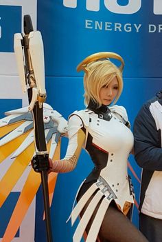 two people in cosplay standing next to each other