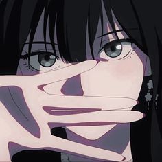 an anime character with black hair and blue eyes is holding her hand to her face