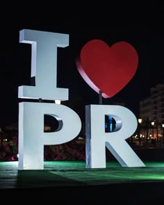 i love pr sign lit up at night