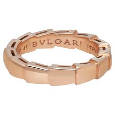 Bvlgari captures the power of seduction in this Serpenti Viper wedding band ring. Sophisticated and glamorous, this ring coils around the finger striking with the precious beauty of the scales. Crafted in lustrous 18K rose gold. Ring size: 47 US 4.25. Band width: 3.6mm. Total weight: 4.17 grams. Made in Italy. Condition: New without tags. Comes with an original box and paper. Bvlgari Wedding Ring, Bvlgari Ring, Bvlgari Serpenti, Bvlgari Jewelry, Luxe Jewelry, Elizabeth Taylor, 18k Rose Gold, Wedding Ring Bands, Band Rings