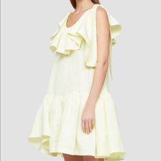 Sleeveless Cotton Poplin Dress With A Ruffled Neckline And An Asymmetrical Self-Tie Shoulder. Ruffled Hemline. * 100% Cotton * Machine Wash Cold With Like Colors. Do Not Bleach. Line Dry. Iron On Medium Heat. Professional Dry Clean Recommended. Color: Pale Yellow Chic A-line Ruffle Dress For Spring, Asymmetrical Hem Ruffled Dress For Day Out, Day Out Dress With Asymmetrical Hem And Ruffles, Day Out Dress With Ruffles And Asymmetrical Hem, Summer Mini Dress With Ruffle And Asymmetrical Hem, Asymmetrical Mini Dress With Ruffle Hem For Summer, Spring A-line Ruffle Dress With Ruffle Hem, Sleeveless Ruffle Dress For Summer Day Out, Chic Summer A-line Ruffle Dress