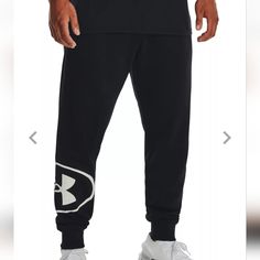 Nwt Men's Under Armour Sweatpants. It Has 2 Front Pockets And Cuffs At Hem. Style Is Loose Fit. Casual Under Armour Pants, Under Armour Bottoms With Elastic Waistband, Under Armour Casual Loungewear Pants, Casual Under Armour Pants For Loungewear, Casual Under Armour Loungewear Pants, Casual Cotton Pants By Under Armour, Under Armour Casual Streetwear Pants, Black Casual Under Armour Sweatpants, Under Armour Streetwear Bottoms With Pockets