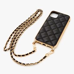 A phone case, necklace and crossbody in one! Sophisticated quilted black case with gold-tone trim and detachable chain for hands-free convenience. Snap-on design Chain Length: 44.5" Material: Plastic Apple Inc. is not responsible for this product. iPhone is a trademark of Apple Inc., registered in the U.S. and other countries. - Claire's Black Quilted Phone Case with Gold Chain - Fits iPhone 11 Luxury Gold Rectangular Phone Accessories, Elegant Black Mobile Phone Bag Accessories, Gold Rectangular Phone Case, Elegant Black Phone Case, Elegant Black Rectangular Phone Case, Rectangular Gold Mobile Phone Bag, Elegant Black Rectangular Phone Accessories, Chanel Iphone Case, Girly Iphone Case