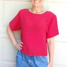 "Rich true red silk shell blouse. Versatile, cut like a tee, so it's great dressed up or down, and makes a great underlayer for jackets and cardigans. Popover style, with shoulder pads. Tagged as a S, intentionally loose fit because there is no stretch. Bust measures 39\" (shown on a 35\", not clipped back), and it's 20.25\" long. Excellent condition, freshly dry cleaned. Check out my other listings, I love to combine shipping! I cannot mark international packages as 'gift', as that is customs f Red Crew Neck Blouse With Relaxed Fit, Shell Blouse, Mohair Cardigan, 1940s Dresses, Butterfly Dress, Sioux Falls, True Red, Boho Maxi, Red Silk