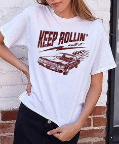 Keep rollin with it. Our newest collection of graphic tees! With distressed, vintage style prints, these are your new go-to wardrobe staple. #graphictee #vintagetshirt #graphictshirt Retro Crew Neck Top With Graphic Print, Retro White Print Tops For Streetwear, Trendy Vintage Print Tops For Streetwear, Trendy Crew Neck T-shirt With Vintage Print, White Casual T-shirt With Vintage Print, Relaxed Fit Graphic Tee With Vintage Print, Retro Vintage Print Tops For Streetwear, Retro Graphic Print Crew Neck Top, Trendy Vintage Print T-shirt For Streetwear