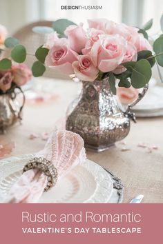 romantic valentine's day tablescape with pink roses in vases