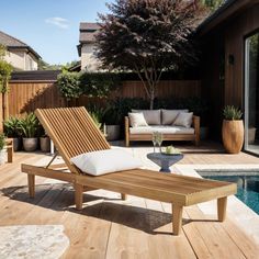 a wooden lounge chair sitting on top of a wooden deck next to a swimming pool