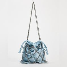 Mini Bucket Bag In Satin Effect Fabric. Bow And Chain Details. Removable Chain Strap. Drawstring Closure. Height X Length X Width: 6.9 X 6.7 X 0.6 Inches (17.5 X 17 X 1.5 Cm) Chic Silver Zara Shoulder Bag, Elegant Blue Bag With Chain Detail, Zara Silver Shoulder Bag For Evening, Zara Silver Evening Shoulder Bag, Silver Zara Shoulder Bag For Evening, Blue Evening Bag With Chain Detail, Zara Party Bags With Chain Strap, Chic Blue Bag With Chain, Chic Blue Bag With Chain Detail