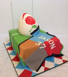 there is a cake that has been decorated to look like a soccer field and ball