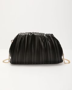 The perfect blend of edgy sophistication and timeless elegance is the Own the Night Textured Leather Clutch. Crafted from pleated faux leather, this clutch adds a unique textured finish that instantly elevates any look. The classic clasp frame closure brings a vintage-inspired touch while the optional chain link shoulder strap, allows you to wear it hands-free for a versatile, on-the-go style or carry it as a sleek handheld clutch. FINAL SALE Material: Pleated faux leather Clasp frame closure One main compartment with interior zipper pocket Optional chain link shoulder strap Dimensions:10.875” L x 4” W x 6.5” H Chic Pouch Evening Bag For Night Out, Black Pouch Clutch For Night Out, Chic Evening Clutch In Faux Leather, Textured Evening Bag, Chic Evening Faux Leather Clutch, Trendy Soft Leather Clutch For Evening, Chic Faux Leather Evening Clutch, Party Clutch In Soft Leather, Elegant Faux Leather Evening Clutch