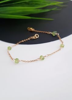 Gold Peridot Bracelet, Peridot Bracelet for Women, Peridot Birthstone Jewelry, August Birthstone Bracelet, Dainty Gold Bracelet Gift For her This is a delicate natural raw Peridot bracelet  All of our jewelry is handmade and every stone is handpicked for the best quality. the color and size of each stone are natural, unique, and individual. Our Elegant Green peridot bracelet is great for a bridesmaid gift, Birthday gift, Bridal Gift, Christmas gift... Each bracelet will be packed in beautiful gi Adjustable Dainty Green Chain Bracelet, Dainty Green Adjustable Chain Bracelet, Green Round Birthstone Bracelet, Green Chain Bracelet For May Birthstone, Adjustable Peridot Bracelets For Gifts, Adjustable Peridot Bracelet, Lime Green Bracelet Jewelry For Gift, Green Dainty Bracelets With Natural Stones, Dainty Green Bracelets With Natural Stones