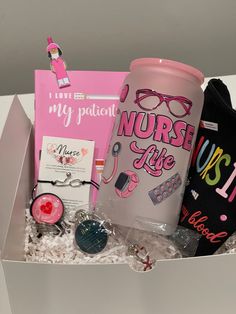 an open box containing items for nurses and nurse's day, including a coffee cup