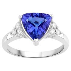 It comes with the Gemological Appraisal by GIA GG/AJP All Gemstones are Natural Tanzanite = 2.30 Carat 6 Diamonds = 0.18 Carats Metal: 14K White Gold Ring Size: 7* US *It can be resized complimentary White Gold Tanzanite Rings With Diamond Cut, White Gold Tanzanite Diamond Ring With Brilliant Cut, Luxury Tanzanite Ring With Diamond Cut, Luxury Tanzanite Diamond Ring With Brilliant Cut, Blue Brilliant Cut Tanzanite Ring, Tanzanite Ring, Natural Tanzanite, 14k White Gold Ring, Cocktail Rings