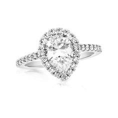 Bold and timeless, this diamond engagement ring ensures an unforgettable moment. Fashioned in 14K white gold, this beautiful look dazzles with a 1 ct. GIA-graded pear-shaped diamond boasting a color rank of I and clarity of Si2. Round diamonds line the frame and shank for a thoroughly sparkling design. Captivating with 1-1/3 cts. t.w. of diamonds and a bright polished shine, this engagement ring is worthy of her affection. This style arrives with a certificate that includes a photo and descripti Pear-shaped Diamond Ring In White Gold, Pear Shaped White Gold Ring For Anniversary, White Gold Pear Shaped Diamond Promise Ring, Pear Shaped Brilliant Cut Ring For Anniversary, Pear Shaped Diamond Rings In White Gold, Silver Pear-shaped Diamond Ring, Pear Shaped Anniversary Ring With Brilliant Cut, Pear Shaped Brilliant Cut Anniversary Ring, Pear-shaped Diamond Wedding Ring