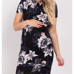 A Floral Printed Fitted Maternity Dress Featuring A Rounded Neckline, Ruched Sides, And Short Sleeves. Perfect For Baby Shower Or Another Occasion. Fitted Maternity Dress, Rounded Neckline, Maternity Dress, Floral Printed, Maternity Dresses, Blush Pink, Colorful Dresses, Floral Prints, Short Sleeves