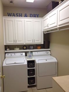 a washer and dryer in a small room