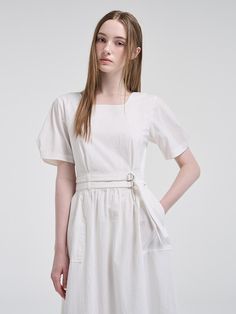 This product is designed with versatility in mind, featuring a 2-way sleeve that allows for multiple styling options. The inclusion of a belt accentuates the waistline, providing a flattering silhouette to this belted dress. Its mid-length hem offers a classic and sophisticated look, suitable for various occasions. - The dress comes with a detachable belt to cinch the waist for a tailored fit.- Puff sleeves can be worn two ways, adding a touch of elegance and adaptability.- Crafted with a subtle A-line cut that gracefully complements the figure.- Complete with a concealed back zipper for a seamless look and easy wear. Summer Belted Dress With Fitted Waist, Elegant Belted Mini Dress For Daywear, Chic Belted Dress With Belt Loops, Elegant Summer Belted Dress With Belted Cuffs, Chic Square Neck Belted Dress, Fitted Summer Midi Dress With Belt, Fitted Midi Dress With Belt For Summer, Chic Belted Square Neck Dress, Spring White Belted Daywear Dress