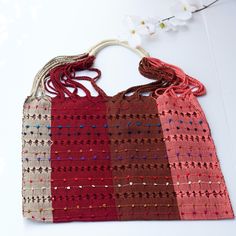 This unique bag is beautifully made on a waist loom, (Telar de Cintura) by artisans from San Juan Andres Larraizar Chiapas México.Each bag is individually handwoven with a unique colors and designs . There is not other like it! Use this reusable and eco-friendly, 100% cotton loom tote bag as a shopping bag for farmer's markets . Dress it down with a t-shirt and jeans or shorts! or to add a boho vibe to any outfit. Details: Tote measurements: 14 x 16.5 Handle drop: 10" Material: 100% Cotton Tasse Multicolor Handwoven Crochet Bag For Daily Use, Multicolor Woven Crochet Bag For Festival, Festival Multicolor Crochet Woven Bag, Red Woven Crochet Bag For Market, Rectangular Woven Crochet Bag For Festivals, Handwoven Multicolor Rectangular Crochet Bag, Multicolor Handwoven Crochet Tote Bag, Multicolor Woven Crochet Bag As Gift, Multicolor Woven Crochet Bag Gift-ready