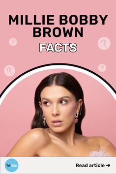 a woman with brown hair and earrings on her head is looking at the camera while she's in front of a pink background that says millie bobby brown fact