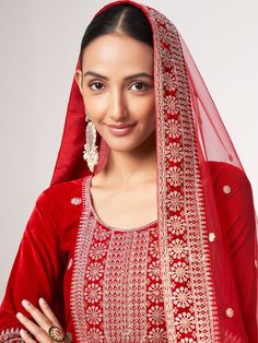 This stunning red color suit features intricate sequin work, zari work, and embroidered details that will make you stand out at any festival, function, or event. The velvet material adds a touch of luxury to the ensemble, while the coordinating santoon pants and net dupatta complete the look.
This gorgeous pink salwar suit is un-stitched and can be customized up to 42 inches, making it easy and convenient to wear. The embroidered and sequin work on the pants and dupatta adds an extra touch of el Red Velvet Pants, Women Salwar Suit, Velvet Pant, Suit With Dupatta, Lehenga Crop Top, Celana Fashion, Lehenga Choli Wedding, Straight Cut Pants, Weddings Receptions