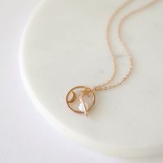 "Beautiful and lovely universe charm necklace made of rose gold moon, star and saturn universe round charm with skinny rose gold plated brass chain. Simple and warm. The necklace is good for yourself or gift! Your necklace will ship in a rudiana gift box. ♥Chain length 14\"- 18\" ♥Charm 1/2\" ♥Rose gold plated over brass / Opal stone ♥ Delivery Time Fast shipping within 1 - 3 days ♥ See more Rudiana Accessories Rudiana.etsy.com" Celestial Rose Gold Necklace As Gift, Dainty Rose Gold Jewelry With Star Charm, Celestial Rose Gold Round Pendant Necklaces, Celestial Rose Gold Necklace With Moon Phase, Celestial Rose Gold Jewelry With Star Charm, Rose Gold Celestial Necklace With Moon Phase, Rose Gold Celestial Jewelry With Star Charm, Celestial Rose Gold Round Pendant Necklace, Dainty Rose Gold Nickel-free Charm Necklace