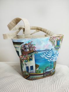 It's a stunning, custom made linen beach bag! Hand painted with acrylic paints, it's a really one of a kind bag.  You'll have an amazing look with it.   It's large enough to fit all your belongings such a small cosmetic pouch, towel, beach slippers, bottle of water, eyeglasses case The bag can be personalized On such a bag, I can paint a picture according to your order Each bag is made to order and in a single copy You'll feel the comfort. Light weighted bag, it's very comfortable to wear it the Hand Painted Beach Bags, Artistic Summer Tote Shoulder Bag, Hand Painted Tote Bag For Summer, Hand Painted Summer Tote Bag, Rectangular Hand Painted Bags For Summer, Summer Hand Painted Rectangular Bags, Hand Painted Rectangular Summer Bags, Handmade Bucket Bag For Beach Season, Summer Beach Linen Canvas Bag