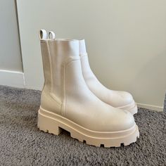 Size: 6 Never Worn White Round Toe Summer Boots, White Boots With Lug Sole For Spring, Spring White Boots With Lug Sole, White Synthetic Boots With Round Toe, White Synthetic Boots With Almond Toe, Cream Round Toe Boots For Spring, White Synthetic Almond Toe Boots, White Almond Toe Synthetic Boots, Chic White Boots With Round Toe