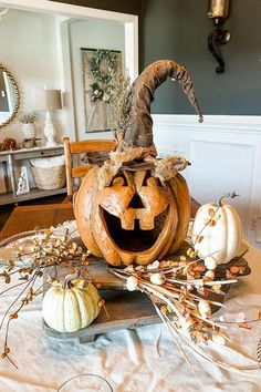 a carved pumpkin sitting on top of a table