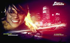 an advertisement for fast and furious featuring a smiling woman in the city with her headphones on