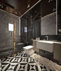 a bathroom with black and white tiles on the floor, walls, and floors is shown