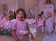 a group of children in pink dresses standing around a bed with the words boy ugh on it