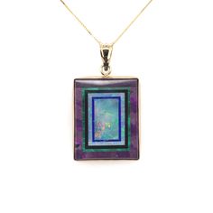 All of our jewelry is guaranteed authentic by our Graduate Gemologist of the Gemological Institute of America (GIA). Kaufmann 14k Gold Genuine Natural Opal Intarsia Pendant with Sugilite (#J6241) 14k yellow gold Intarsia pendant made with opal inlaid in sugilite with malachite, lapis, and black jade. The intarsia was made and is signed by Jim Kaufmann. The intarsia stone measures about 20.5mm x 25.5mm and weighs 27.06 carats.  The pendant measures 1 1/2" long with the bail and includes a new 14k Purple Cabochon 14k Gold Jewelry, Elegant 14k Gold Jewelry With Inlay, Elegant Yellow Gold Jewelry With Inlay, Luxury Purple Rectangular Jewelry, 14k Gold Jewelry With Inlay As Gift, Gold Rectangular Multi-stone Jewelry, Black Jade, Big Bend, Natural Opal