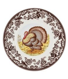 a white and brown plate with a turkey on it