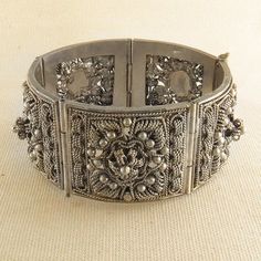 Balinese Style Vintage Cuff Bracelet, Ornate Cuff Victorian Cuff Bracelet With Intricate Design For Ceremonial, Victorian Cuff Bracelet With Intricate Design For Ceremonial Occasions, Victorian Style Ceremonial Cuff Bracelet With Intricate Design, Ornate Silver Cuff Bracelet For Festivals, Elegant Ceremonial Cuff Bracelet With Oxidized Finish, Ceremonial Oxidized Finish Cuff Bracelet, Elegant Ceremonial Oxidized Cuff Bracelet, Ceremonial Oxidized Finish Elegant Cuff Bracelet, Elegant Ceremonial Sterling Silver Bracelet With Oxidized Finish