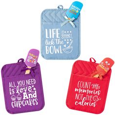 three oven mitts with sayings on them