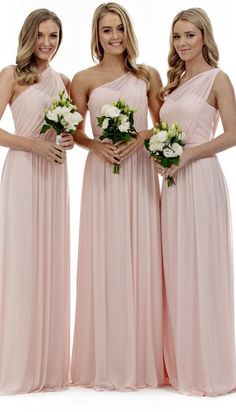 the bridesmaids are wearing different styles of dresses and bouquets in their hands