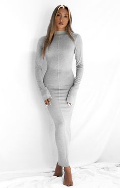 A classic long sleeve silhouette with an elevated edge. Featuring a high neck, long bunched sleeves and centre seam detailing. Designed to drape over every curve, pair with boots and a Biker by day, or heels by night. 70% modal | 30% polyester Buttery soft hand feel Exposed stitch detailing on centre front and back High neckline and raw edge hems for elevated design Extra long sleeves to bunch over wrist Size small centre front length = 142cm with 2cm grading between sizes Also available in blac Sleeve Silhouette, Maxi Dress Prom, Extra Long Sleeves, Minimalist Wardrobe, Mid Dresses, Streetwear Women, Soft Hand, High Neckline, Raw Edge