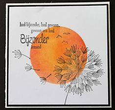 a card with an orange and dandelion design on the front, in black ink