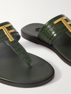 TOM FORD's 'Brighton' sandals belong on the coast, be it in the South of France or Amalfi. This pair is made from supple leather and topped with a tonal logo plaque along the classic T-bar strap. Rubber soles promise comfort and substantial grip. Leather Sandals For Men, Tom Ford Shoes, Velvet Sandals, Latest Sandal, Green Sandals, Sandals For Men, Mens Leather Sandals, Leather Thong Sandals, Brown Leather Sandals