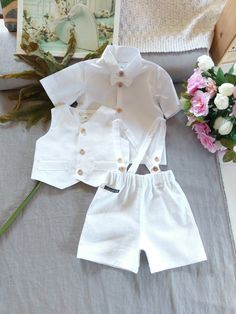 This linen boys set is perfect for different occasions. ☘️The shirt has wooden buttons and shirt sleeves. ☘️ The shirt has matching bow tie with invisible naps. ☘️The shorts has suspenders with buttons, you can regulate them hight. The shorts has an elasticated waistline. ☘️Matching linen hat with the elastic part at the back side made the good hat fitting. ☘️You can choose the west to a completely set. West has wooden buttons and linen lining You can choose a colour, please, add a notice with t White Linen Summer Sets, Classic White Sets For Summer, White Baptism Sets For Summer, Classic White Linen Set, White Summer Baptism Sets, White Sets For First Communion In Summer, White First Communion Sets For Summer, West Boy, Linen Hat