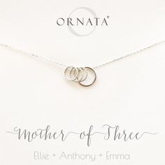 “Mother of Three” Personalized Sterling Silver Necklace | One Adult  & Three Children | “Mother of Three” sterling silver necklace. Families come in all shapes and sizes. Ornata specializes in creating beautiful sterling silver jewelry that celebrates the unique constellations of family for the women who hold them dear. This design features one large and three small sterling silver freely moving rings. Hammered Silver Jewelry, Three Children, Jewelry Card, Kids Jewelry, Sterling Silver Necklace, Cute Jewelry, Sterling Silver Necklaces, Personalized Jewelry, Silver Necklaces