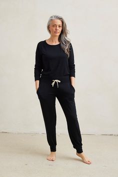 The Loungewear Set You've Been Dreaming Of. Combine the stylish and comfortable Harem Pants with the loose Relaxed Long Sleeve Top to create the loungewear set of your dreams! Made from our signature ultra-soft and moisture-wicking fabric blend. Includes a Relaxed Long Sleeve Top and Harem Pants. Made in Canada. Ultra-soft 93% Viscose from Bamboo / 7% Spandex. XS (0-2), S (0/2-4/6), M (6-8/10), L (10-12/14), XL (14-16/18), XXL (18-20/22). Machine washable & dryer friendly. Fabric patterns designed by and exclusive to This Is J. Casual Black Sweatpants For Relaxation, Black Casual Sweatpants, Relaxed Black Loungewear Pants, Versatile Joggers For Loungewear, Black Relaxed Fit Pants For Relaxation, Black Joggers For Fall Loungewear, Versatile Relaxed Fit Activewear For Loungewear, Black Sweatpants For Fall Loungewear, Black Relaxed Fit Casual Pants