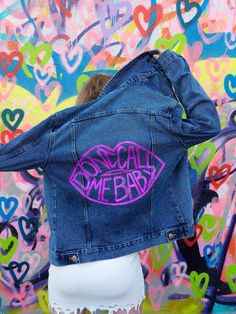 "Oversized, Mid to Dark Wash Denim Jacket with a Painted \"Don't Call Me Baby\" Graphic on the Back. Jacket Does Not Come with Pins, as Pictured. Hand Painted with Washable Textile Fabric Paint (Hand Wash, Hang to Dry). Jacket is a Size 2  \"Boyfriend\" Style. Fits a XS/S. Model 5'2\" **However, Jacket can be purchased with the two FizzPop (High Quality Enamel) Pins on the Front of the Jacket Collar for $145, Message Me For Details**" Trendy Medium Wash Denim Jacket With Graphic Print, Pink Denim Outerwear For Streetwear, Pink Denim Jacket For Streetwear, Call Me Baby, Style Denim Jacket, Upcycled Denim Jacket, Dark Wash Denim Jacket, Painted Denim Jacket, Dont Call Me