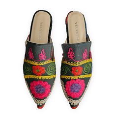 Velvetica Slippers with embroidery cotton fabric..all handmade, needle work.. Velvetica mules blend style and comfort with vibrant colors and durable silk velvet. These slip-on flat mules, perfect for any outfit, provide a secure fit without causing blisters. Ideal for quick errands or casual days, they make a versatile and thoughtful gift, packaged in a stylish black Velvetica dustbag. Size: 36-42 available  Hand-made in Turkey.  Free Worldwide shipping with DHL/Fedex/UPS Disclaimer: Product's Bohemian Spring Mules, Multicolor Flat Mules For Summer, Handmade Artisan Mules For Summer, Traditional Flat Mules For Summer, Traditional Flat Summer Mules, Handmade Bohemian Mules For Spring, Multicolor Slip-on Mules For Spring, Multicolor Closed Toe Mules For Spring, Spring Multicolor Closed Toe Mules