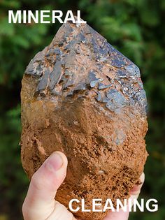 a person holding up a large rock with dirt on it and the words, mineral cleaning