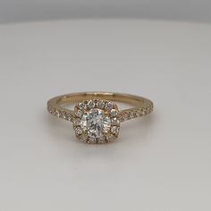 an engagement ring with diamonds on it